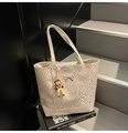 White tote bag with geometric embroidery, silver bow buckle, and cute cartoon pendant - Beige With Charm