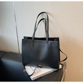 Minimalist black lychee texture leather tote bag with sturdy handles and crossbody strap - Black