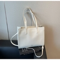Minimalist cream white pebble leather tote bag with top handles and adjustable shoulder strap - Off White