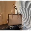 Light coffee textured leather tote bag with silver logo and adjustable shoulder strap - Gray