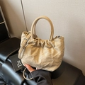 Elegant beige ruched bucket bag in soft vegan leather with stylish top handle and strap - Khaki