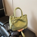 Chic light green bucket bag in soft PU leather with elegant pleats and silver hardware - Green