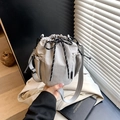 Light grey nylon drawstring bucket bag with adjustable strap and side mesh pocket - Gray