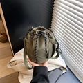 Army green nylon drawstring bucket bag with adjustable straps and side mesh pockets - Dark Green