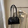 Glossy black Boston shoulder bag featuring unique wavy edge detailing and dual handles - Black without Pendant