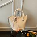 Creamy white crossbody bucket bag with elegant pink ribbon and pearl charm detail - Yellow with Pendant