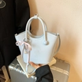 Light blue bucket bag with pink bow and pearl pendant, chic faux leather crossbody purse - Blue with Charm