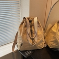 Minimalist khaki nylon drawstring backpack with waterproof texture and wide straps - Khaki