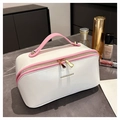 White and pink travel makeup bag with leather handle and fashion print details - Pink