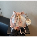 Pink leather jacquard bucket bag with floral weave and white sheep charm accessory - Pink with Pendant