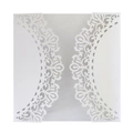 Detail of white laser-cut floral wedding invitation cover with intricate trifold pattern - White