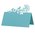 Macro detail of laser-cut lake blue rose table card with pearl paper texture - Tiffany Blue