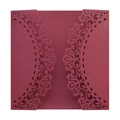 Detail of laser-cut burgundy invitation cover with elegant floral vine patterns - Dark Red