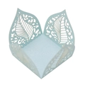 Detail of light blue laser-cut pearlescent paper wrapper with intricate leaf patterns - Pearl Pale Blue
