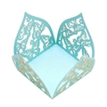 Macro detail of light blue laser-cut butterfly hollow pattern on candy box paper - Pearl Pale Blue