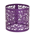 Macro shot of purple laser-cut paper napkin ring with intricate floral lace pattern - Deep purple