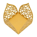 Macro detail of laser-cut vine patterns on a golden glitter gift box for chocolate - Gold
