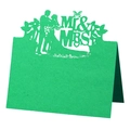 Macro detail of laser-cut Mr & Mrs green cardstock wedding place card with silhouette - Dark Green