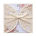 Detail of laser-cut glitter butterfly wedding invitation with elegant ribbon bow - Ivory