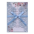 Elegant laser-cut light blue wedding invitation with rose patterns and a silk ribbon bow - Fog Blue
