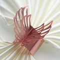 Detail of rose gold wing napkin ring with hollow design on a white cloth napkin - 20cm / Mirror Rose Gold