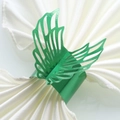Close-up of emerald green butterfly napkin ring with intricate laser-cut metal wings - 20cm / Mirror Dark Green