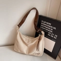 Cream canvas tote bag with brown leather straps and minimalist TCT logo detail - Beige Grey