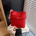 Chic vibrant red lychee pattern bucket bag with adjustable shoulder strap for women - With Charm / Red