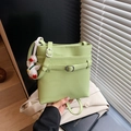 Light green litchi texture bucket bag with a cute white plush duck charm and silver buckle - With Charm / Green