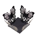 Macro detail of laser-cut black hollow butterfly candy box with delicate wing patterns - Mirror Black