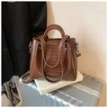 Brown crocodile embossed tote bag with dual handles and long shoulder strap - Brown
