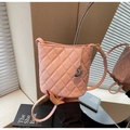 Pink quilted bucket bag with silver heart pendant and stylish leather shoulder strap - Pink