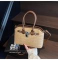 Beige woven straw handbag with brown faux leather trim and metallic lock detail - Brown