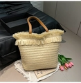 Light beige woven straw tote bag with fringe detail and brown leather handles - White