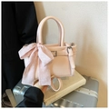 Detail of pink faux leather square bag with polka dot scarf and silver metal buckle - Pink
