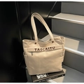 Minimalist beige canvas tote bag with letter strap detail and rivets for women - Beige Grey
