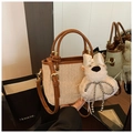 Beige woven bucket bag with brown leather trim and a cute plush dog pendant - Khaki with Pendant