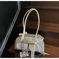 Silver-grey pleated saddle bag with ribbon bows and heart charm on wooden stairs - With Charm Style / Blue (With Heart Pendant)