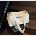 Beige canvas cylinder tote bag with blue embroidery and adjustable shoulder strap - Off White