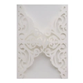 Macro detail of laser-cut pearl paper wedding invitation with floral lace patterns - Ivory