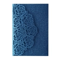 Close-up of navy blue glitter invitation with laser-cut rose hollow patterns - Sapphire Blue