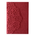 Detail of red glitter laser-cut invitation cover featuring intricate rose patterns - Red