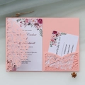 Detail of pink laser-cut rose wedding invitation set with floral inner cards and RSVP - Pink