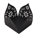 Close-up of black laser-cut hollow floral lace patterns on a decorative candy gift box - Black