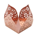 Macro view of rose gold laser-cut floral pattern on mirror finish candy box wrapper - Mirror Rose Gold