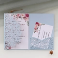 Detailed laser-cut light blue floral wedding invitation with rose pattern inserts - Fog Blue
