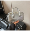 Detailed macro view of silver metallic PU handbag with a top zipper and chain strap - Silver