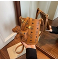 Brown litchi grain mobile phone bag with teddy bear pattern and bear charm detail - Brown with Pendant