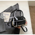 Black ballet-style bowling bag with lace trim, bow, and pearl charm detail - Black With Pendant