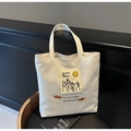 Minimalist beige canvas tote bag featuring Moon and Sixpence literary print design - Off-white